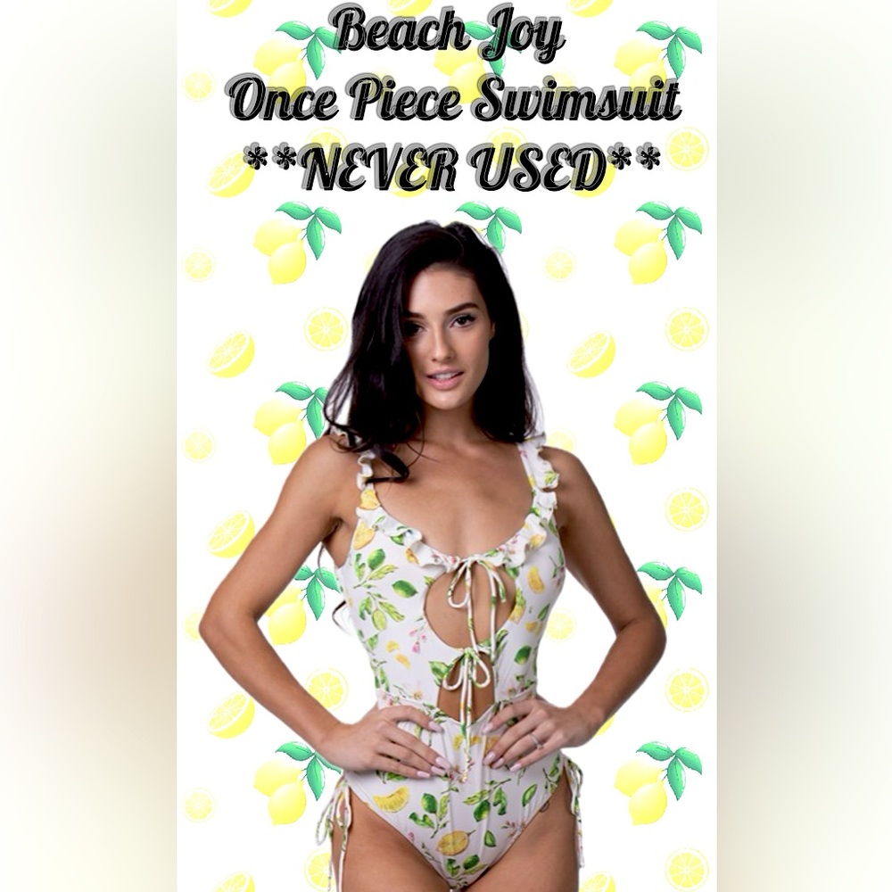 Once Piece Swimsuit Lemon Print **NEVER USED**
Brand:Beach Joy